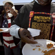 Naomi Williams and D’Emanuel Grosse Sr. taste the sweet potato pie entered in the cook-off contest at the Juneteenth, Black Independence Day, celebrations at Nichol Park on June 19, 2004, in Richmond, Calif.
David Paul Morris/Getty Images